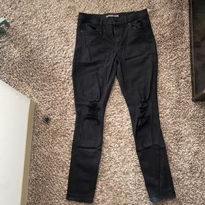 Express high waisted skinny jeans, size 10 black, distressed in the knees. e.